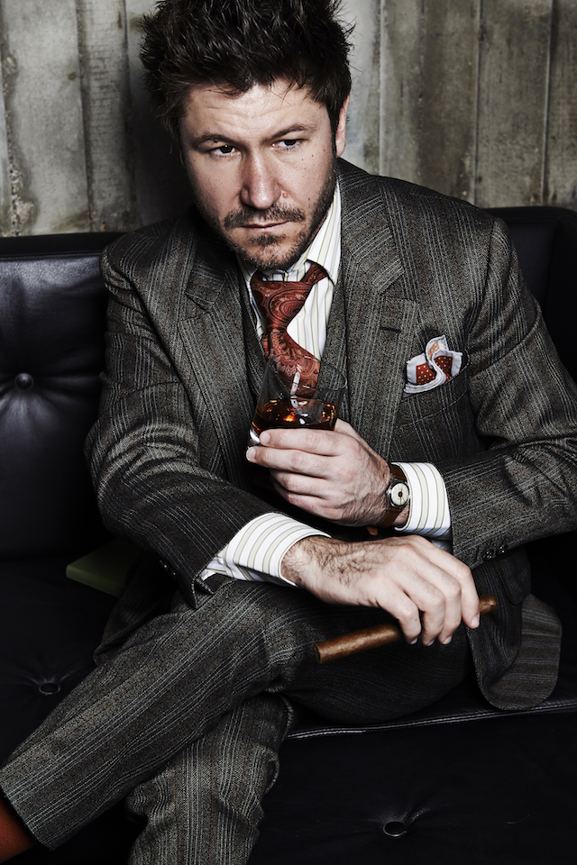 Justin Leone in a suit by Alexander (Savile Row)