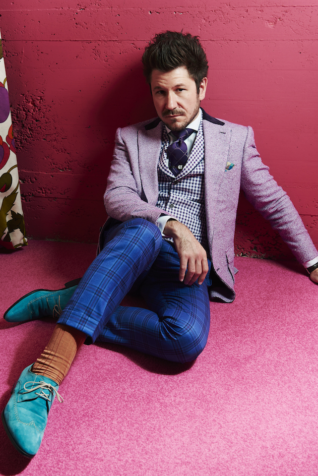 Justin Leone in a suit by Dieter Betz in Tantris restaurant